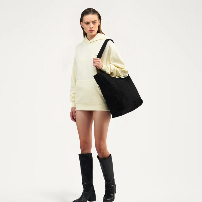 Front view of VAROSH ZOVANI® Vanilla White Drop Shoulder Hoodie for women – relaxed fit luxury streetwear.
