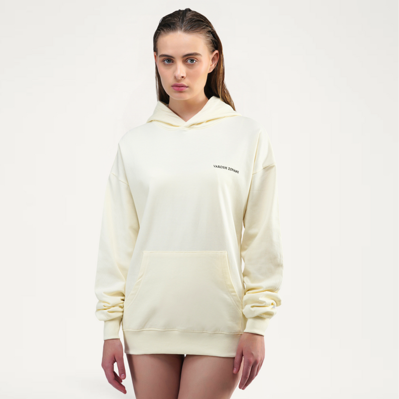 Close-up of VAROSH ZOVANI® HD logo print on Vanilla White women’s drop shoulder hoodie.