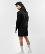 Rear view of Falcon black hoodie showing its plain back and hood